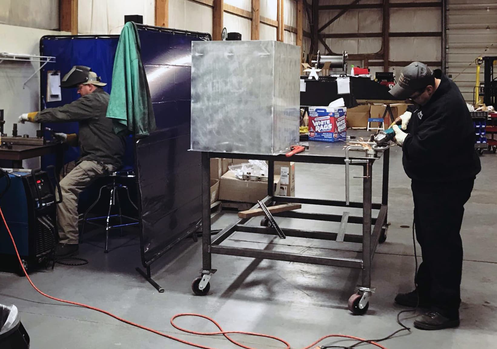 EFES technician fabricating custom fire equipment