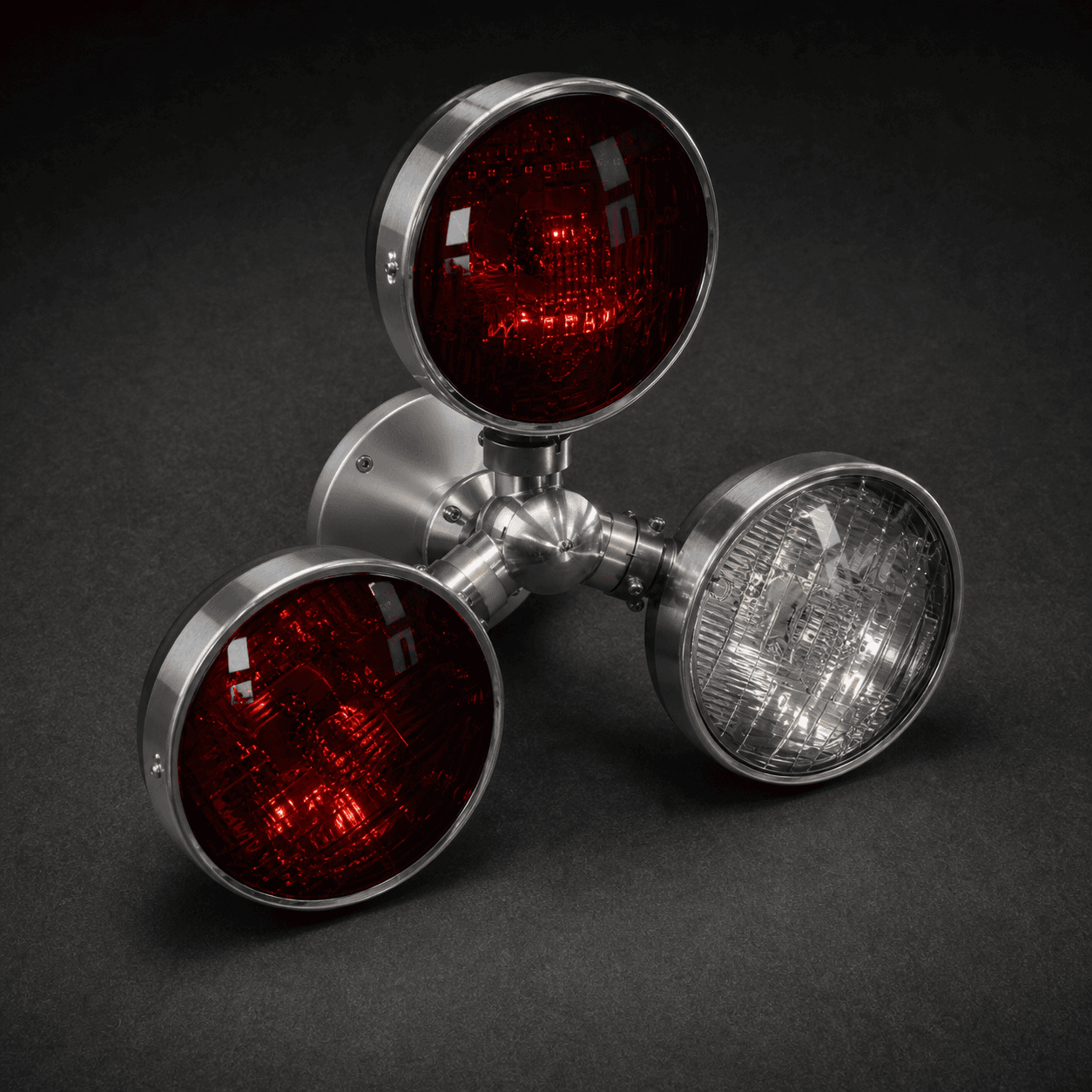 Three-quarter detail of the Roto-Rays lamp heads and polished spinning hub